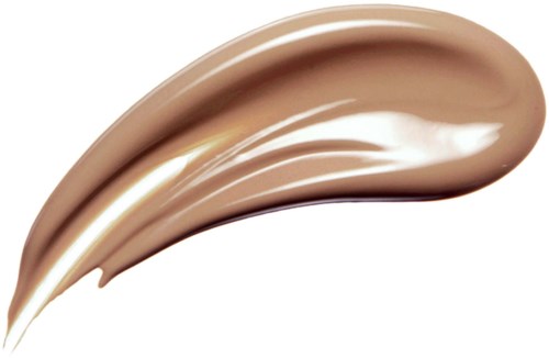 A smear of beige-colored cream or lotion on a white background, shaped like a teardrop or a streak.