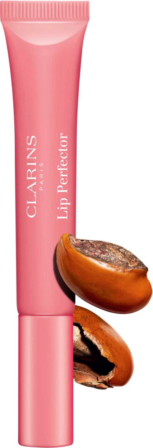 Rosa Tube mit 'Clarins Lip Perfector' und zwei braune Lippenbalsam-Nüsse daneben.