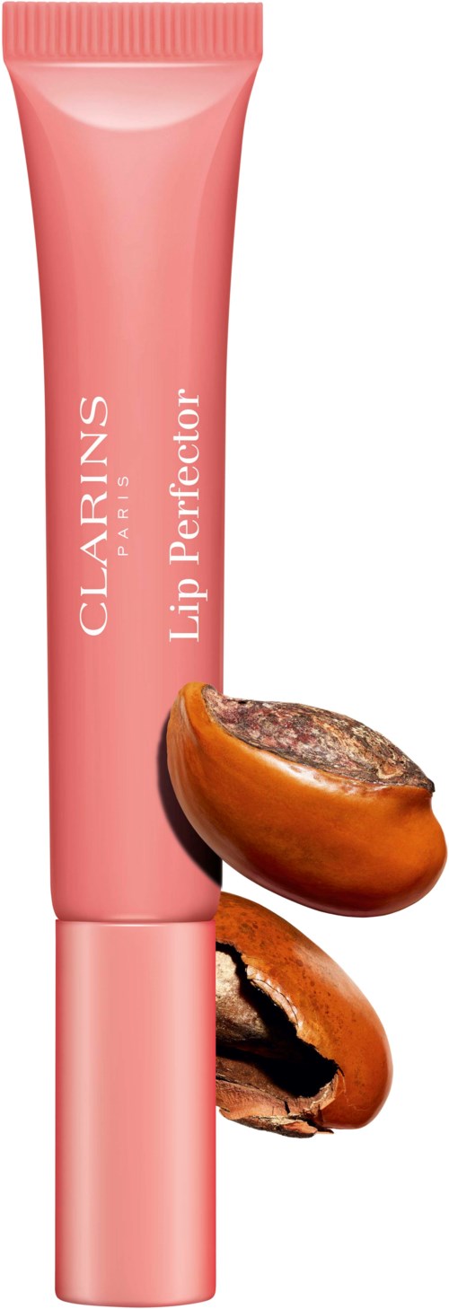 Roze tube met 'Clarins Lip Perfector' en twee koffiebonen ernaast.