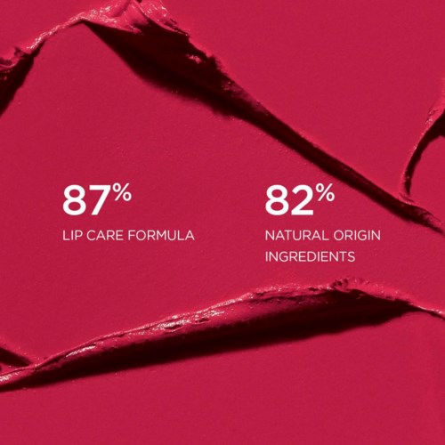 Lip care formula with 87% and natural ingredients at 82%. Bright pink background. Text highlights product features.