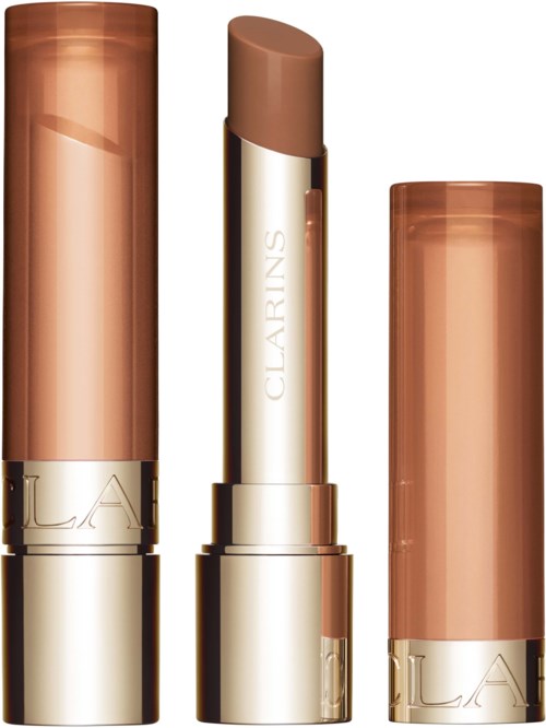 Een lippenstift met beige kleur en een glanzende goud- en beige behuizing, zonder dop.