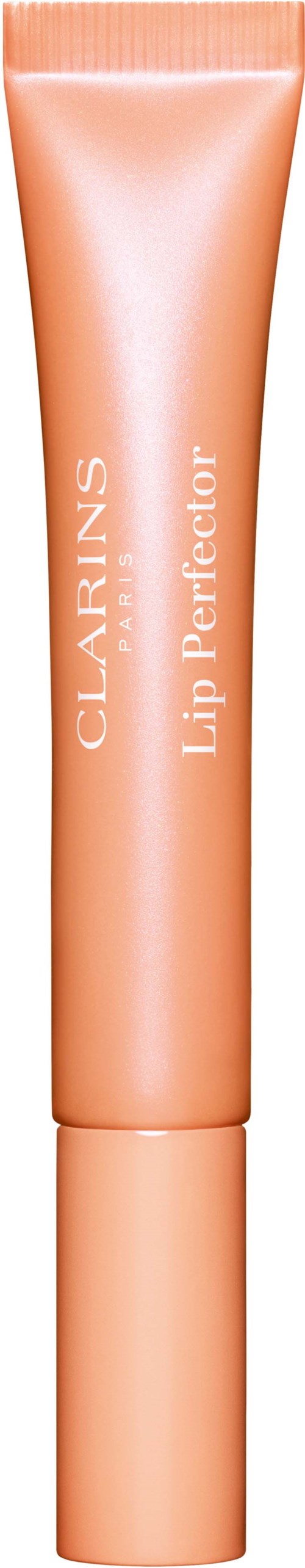 A peach-colored tube labeled 'Clarins Lip Perfector' stands vertically on a black background.