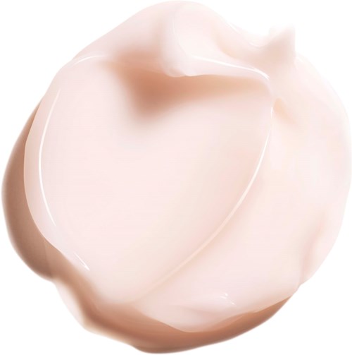 A dollop of light pink lotion or cream with a smooth, creamy texture.