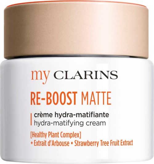A jar of hydra-matting cream with orange and black text, including plant extracts and strawberry tree fruit.