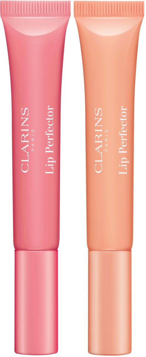 Twee lippenbalsemtube, één roze en één perzik, met 'Clarins Lip Perfector'.