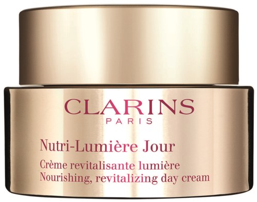 Kultainen purkki Clarins Nutri-Lumière Day Cream, jossa on vaaleanpunainen ja punainen teksti.