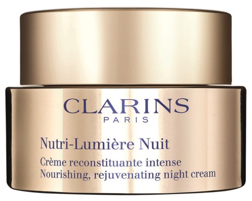 Kullansävyinen Clarins Nutri-Lumière Nuit yökätä, jossa on sinistä ja violetin tekstiä.