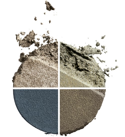Ingeklapt make-upproduct in vier kleuren: beige, groen, blauw en bruin, met gerichte stofdeeltjes.