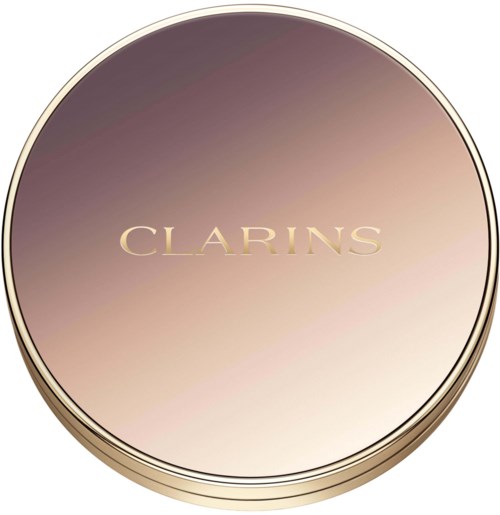 A round container with a shiny gradient gold lid and the word 'CLARINS' on top.