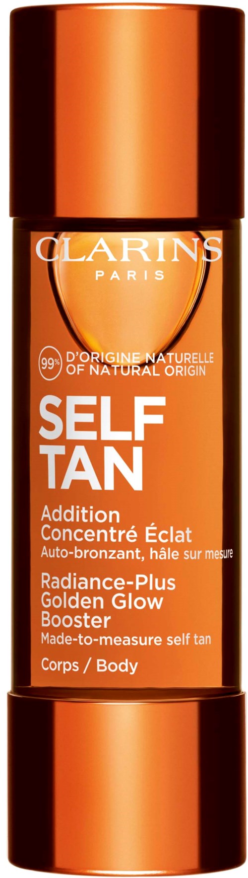 Eine lange, orangefarbene Sprühflasche mit Clarins Self Tan Body-Lotion, weiße und schwarze Beschriftung.