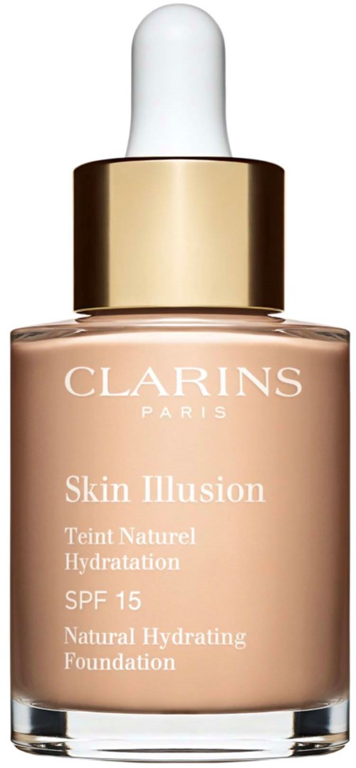 A foundation bottle with a white dropper cap, beige liquid, and gold details, labeled Clarins Skin Illusion.