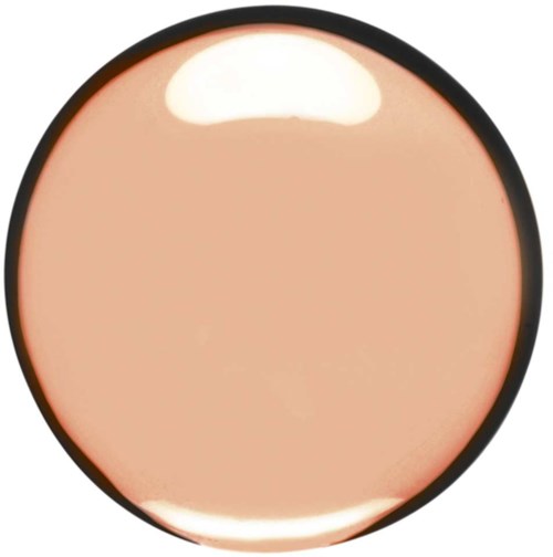 A round makeup compact with peach-colored powder inside. The compact has a black outer rim.