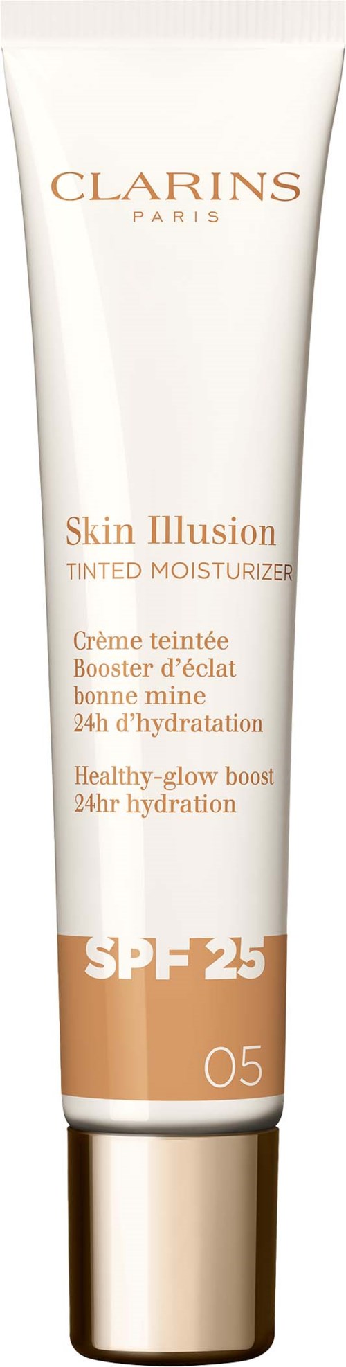 Valkoinen putkilö Clarins Skin Illusion sävyvoideella ja SPF 25. Siinä on kultainen korkki ja beiget merkinnät.