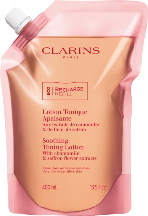 Ett rosa och beige påfyllnadsförpackning av Clarins lugnande toningsvatten med kamomill och saffransextrakt.