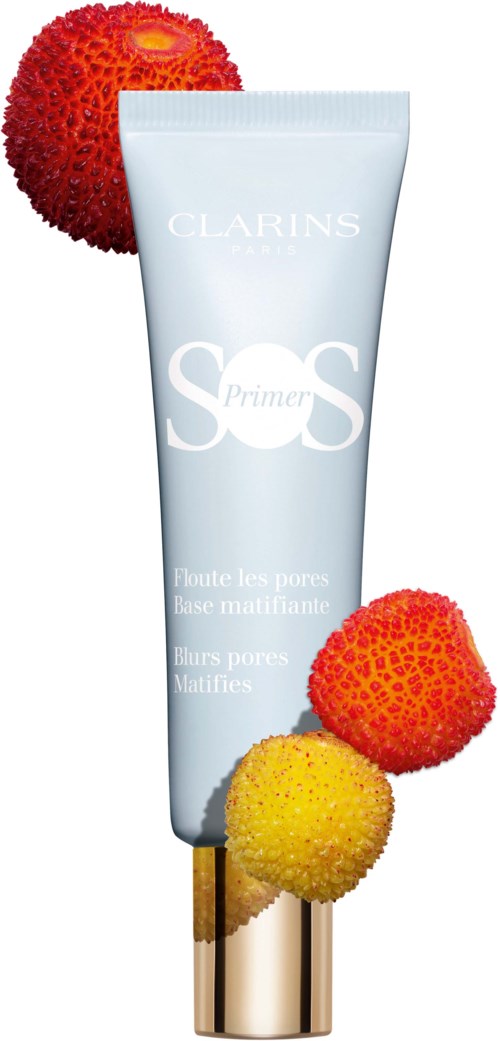Clarins SOS Primer -putki, ympärillä värikkäitä lohikäärmehedelmiä.