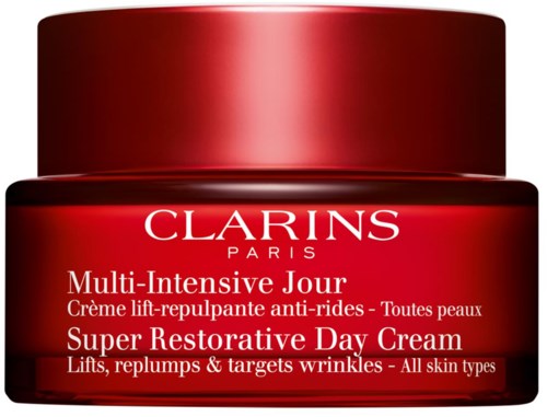 Roter Behälter mit Clarins Super Restorative Day Cream für alle Hauttypen, hebt und reduziert Falten.