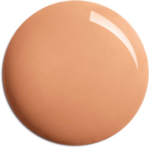 A round, brownish-beige makeup sponge with a smooth surface and shiny reflection.