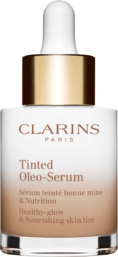 Een witte fles met pipet, labelled Clarins Tinted Oleo-Serum, voor huidverzorging en een gezonde gloed.