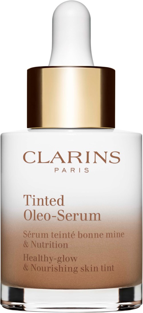 A Clarins Paris bottle with a dropper, labeled Tinted Oleo-Serum, for nourishing skin glow, in white and gold.