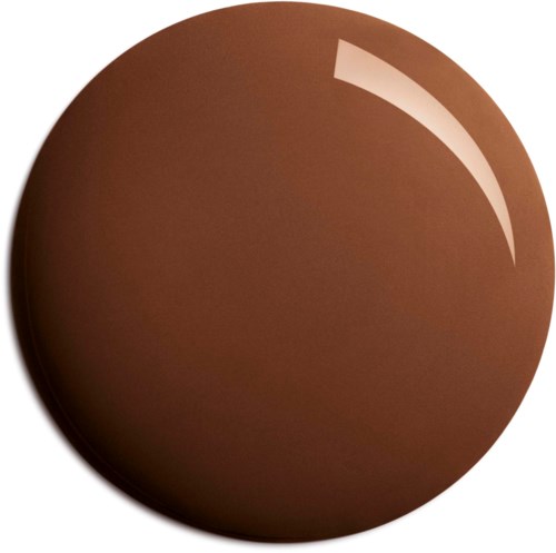 Een glanzende, bruine, ronde voorwerp dat op chocolade of een bal lijkt.