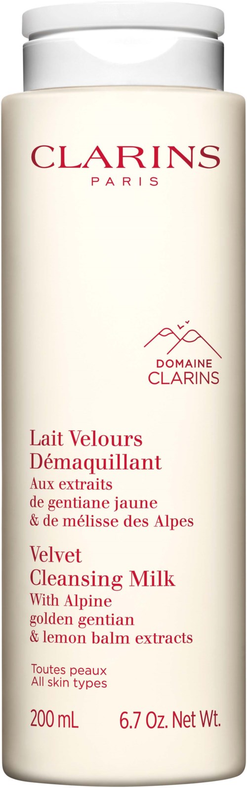 A white bottle with red and pink text. It is Clarins Velvet Cleansing Milk for all skin types, with yellow gentian and lemon balm.