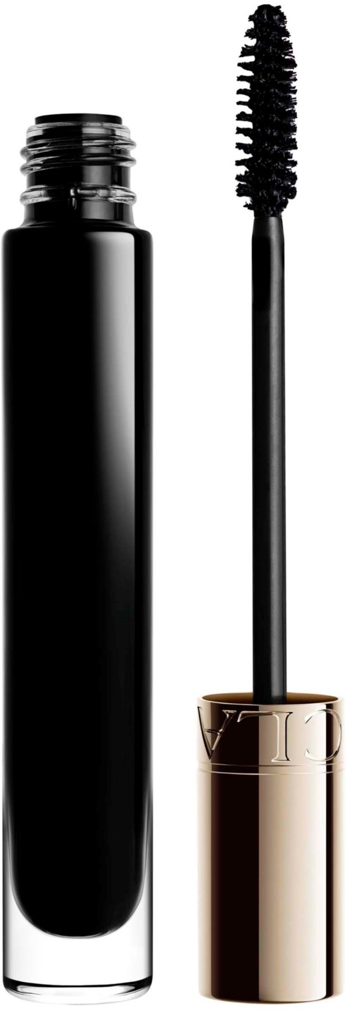 A black mascara tube with a wand and brush ready for applying makeup.