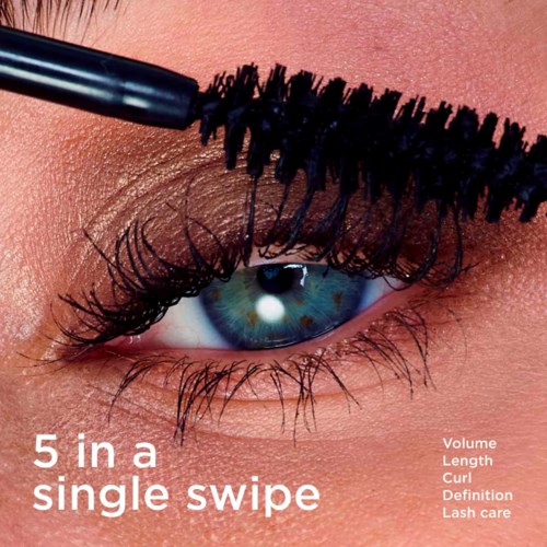 A close-up of a blue eye with long eyelashes, showing mascara being applied with a brush. Text about mascara application.