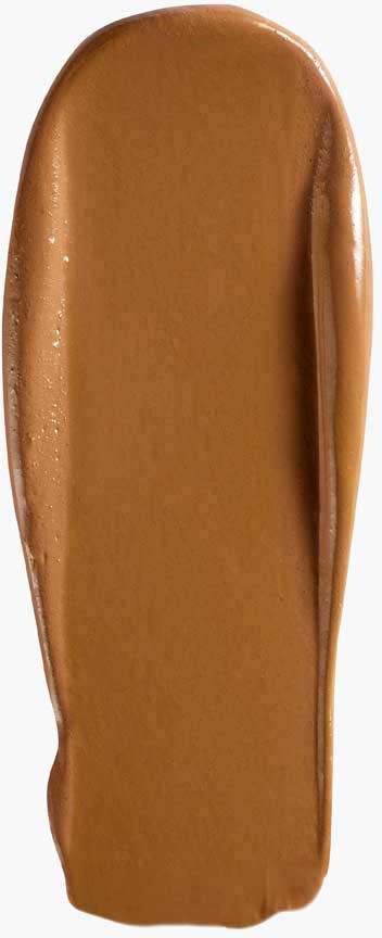 Een gladde, ovale lepel met een glanzend, karamelkleurig oppervlak.