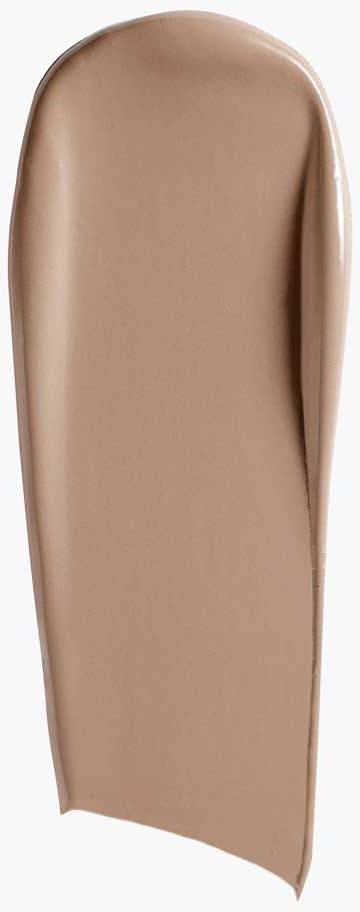 Een beige langwerpige make-up of huidverzorgingsproduct tube met dop.