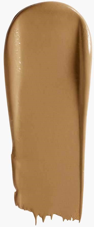 Een grote strook beige of bruin make-up of crème op een witte achtergrond.