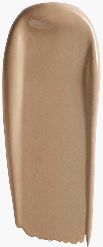 Een beige make-up concealerstick met ronde bovenkant en platte onderkant.
