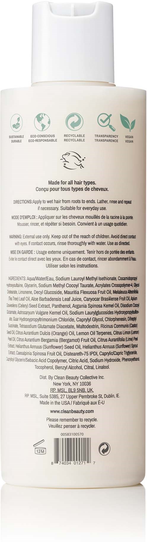 En vit flaska med stängningslock, innehållande schampo. Den har ikoner och text på baksidan, som listar ingredienser och instruktioner.