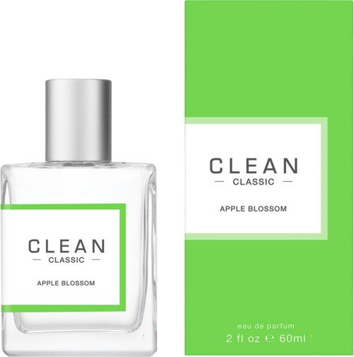 Ein Parfümflasche und eine Schachtel in Grün, Weiß und Schwarz, beschriftet 'CLEAN Classic Apple Blossom.'