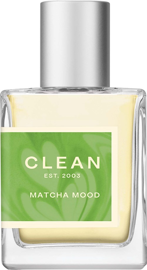 En klar glasflaska med silverlock, grön etikett med vit text, innehåller hudvårdsprodukten Matcha Mood.