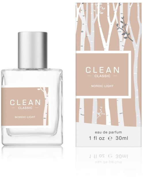 En parfymflaska och förpackning med minimalistisk beige träddesign, märkt "CLEAN CLASSIC NORDIC LIGHT."