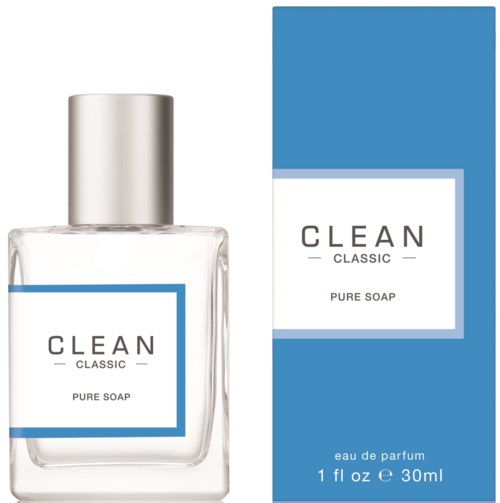 Een doorzichtige zeepfles met zilveren dop naast een blauwe doos, beide gelabeld 'CLEAN CLASSIC PURE SOAP' en 'eau de parfum'.