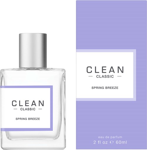 Een parfumfles en doos met de tekst "Clean Classic Spring Breeze" en een paarse en witte ontwerp.