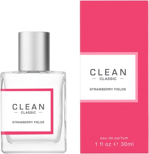Een helder parfumflesje en roze doos met tekst over Strawberry Fields-geur. Het flesje heeft een zilveren dop.