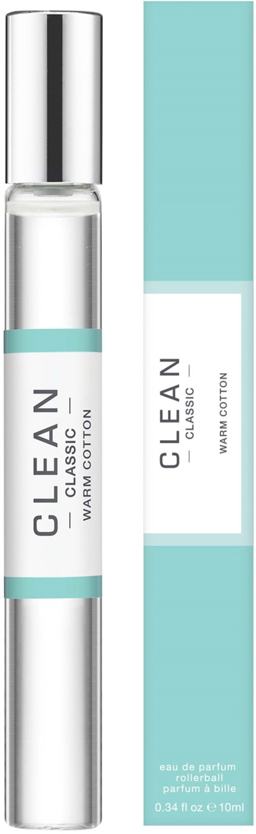 A small clear perfume bottle with a silver cap and a light blue box nearby. The box has text about a fragrance.