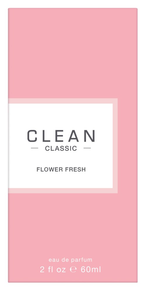 Een roze en witte parfumdoos met de woorden "CLEAN CLASSIC FLOWER FRESH".
