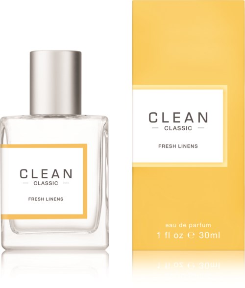 Een parfumfles met 'CLEAN CLASSIC' en 'FRESH LINENS' naast een geel doosje met dezelfde tekst.