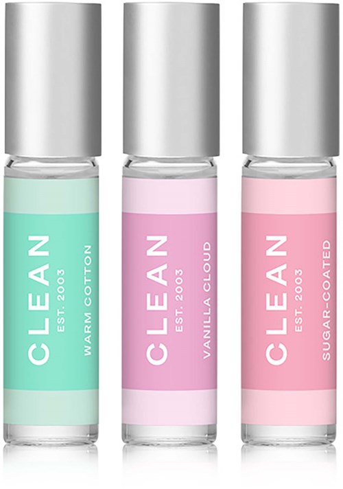 Three lip gloss tubes labeled WARM COTTON, VANILLA CLOUD, and SUGAR-COATED, with silver caps and pastel-colored bottles.