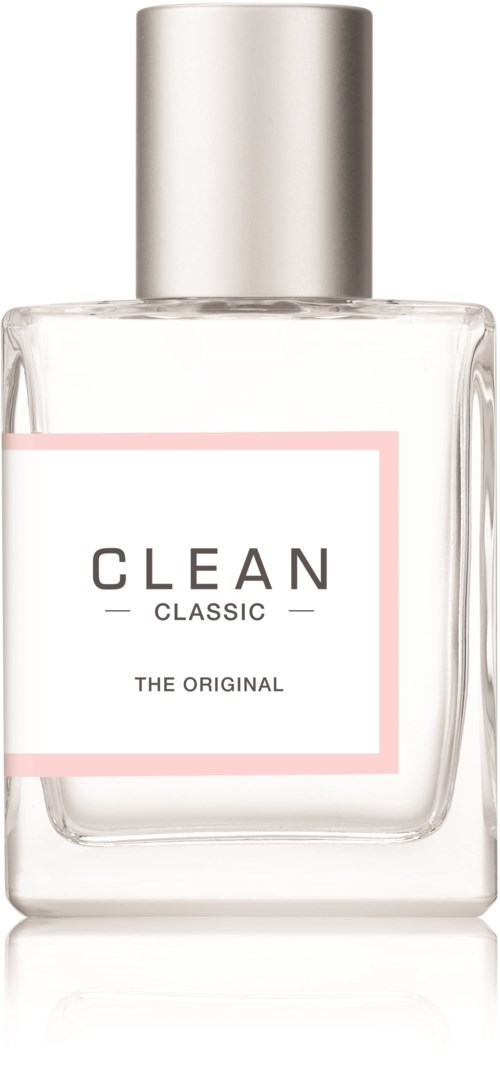 Een helder glazen fles met zilveren dop, gelabeld 'CLEAN CLASSIC THE ORIGINAL'.