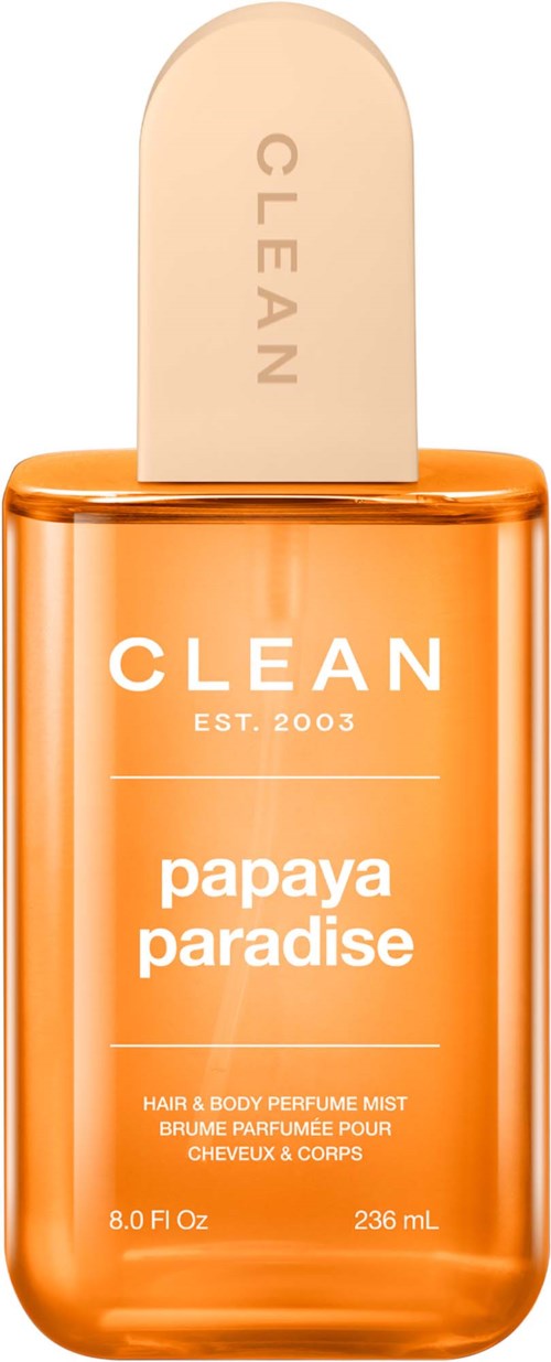 Eine Parfümflasche mit dem Namen Papaya Paradise, orangefarbig mit weißem Deckel, für Haare und Körper.