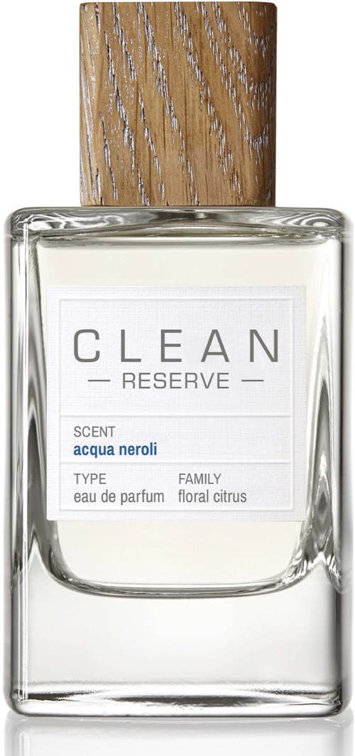 En parfyllåda med ett trälock och en vit etikett som säger "CLEAN RESERVE" och "acqua neroli."