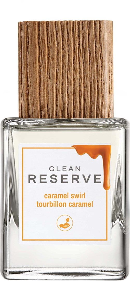 En genomskinlig nagellackflaska med ett trälock och en etikett som läser clean RESERVE caramel swirl.