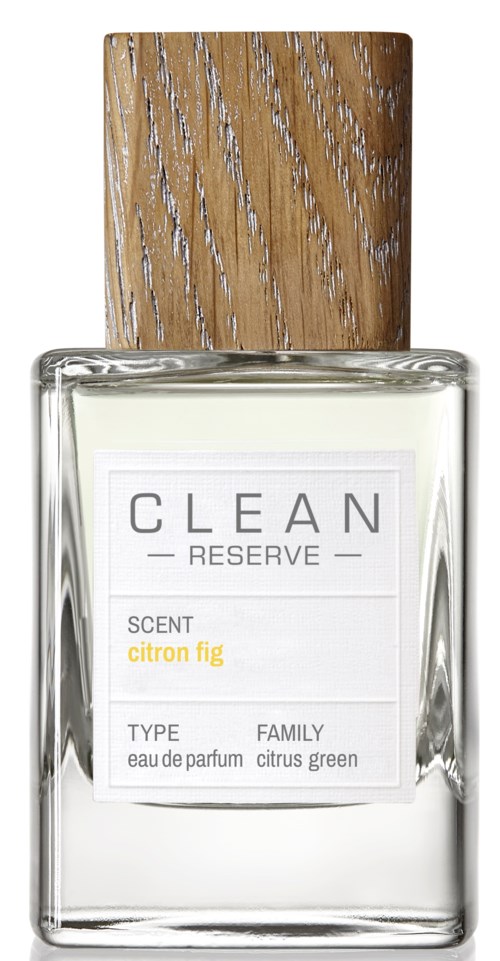 Een parfumfles met houten dop, label 'CLEAN RESERVE' met geur 'citron fig.'