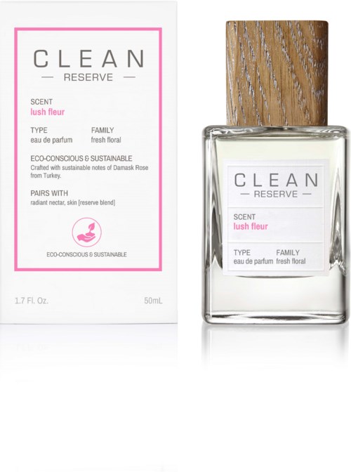 En parfylldropp och box märkt 'CLEAN RESERVE' med rosa accenter, doft 'lush fleur' och ekologiska detaljer.