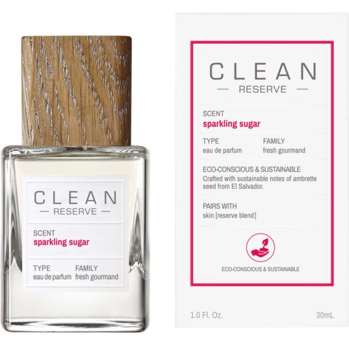 Ein Parfümflasche mit Holzdeckel und Etikett, das Aroma ist sparkling sugar, umweltbewusst und frisch. Es ist Teil einer Serie.