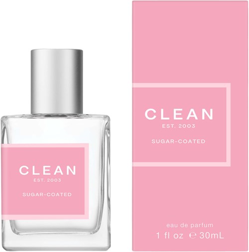 A perfume bottle and box are pink and white, labeled "CLEAN" and "Sugar-Coated," with details about size and est. year.